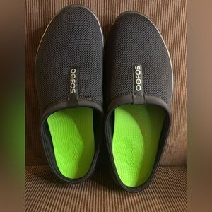 OOFOS OOMG Low Black Slip-Ons with Green Insoles